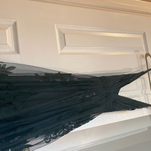 Long dark green dress.